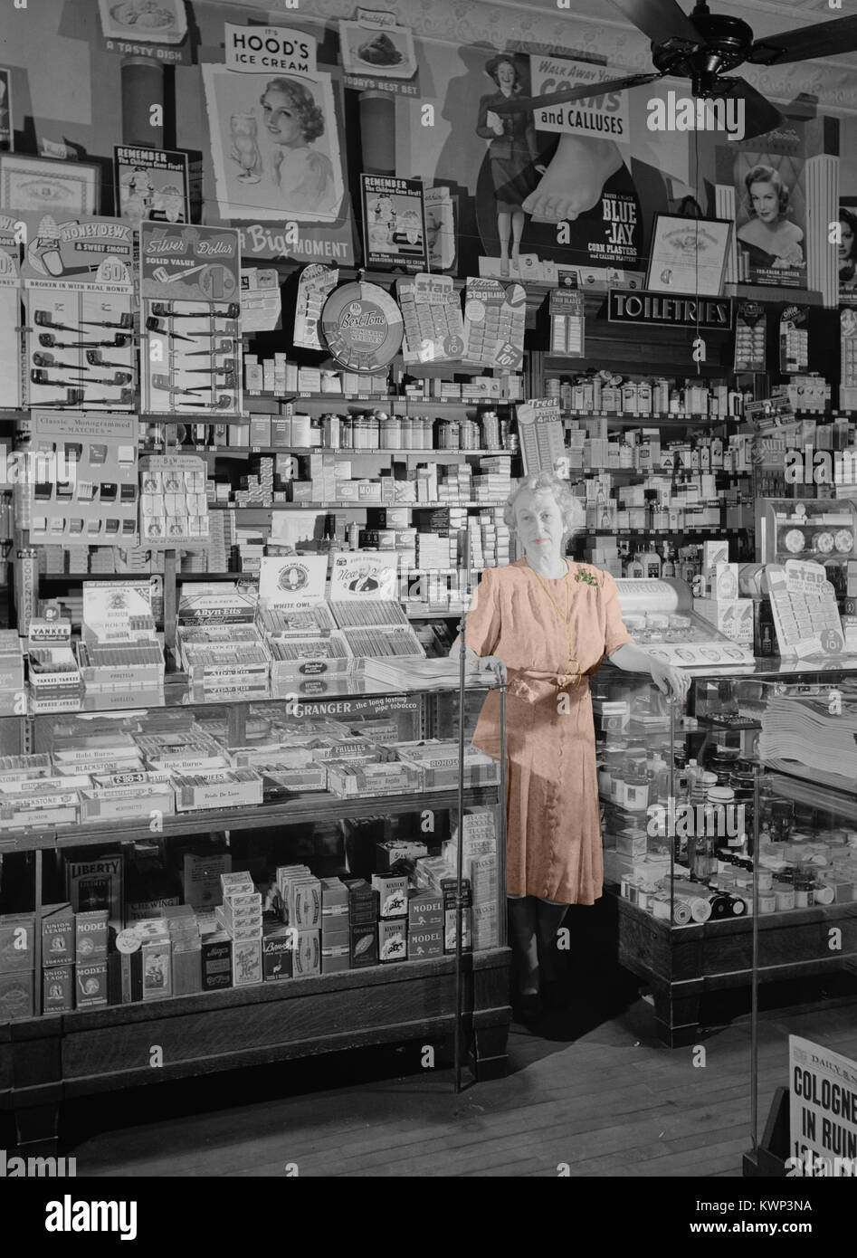 Colorized vintage photo of a drug store circa 1942. Stock Photo