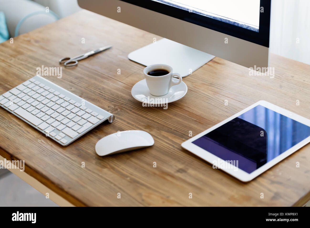 Picture of office desk with tablet computer and other accessories Stock ...