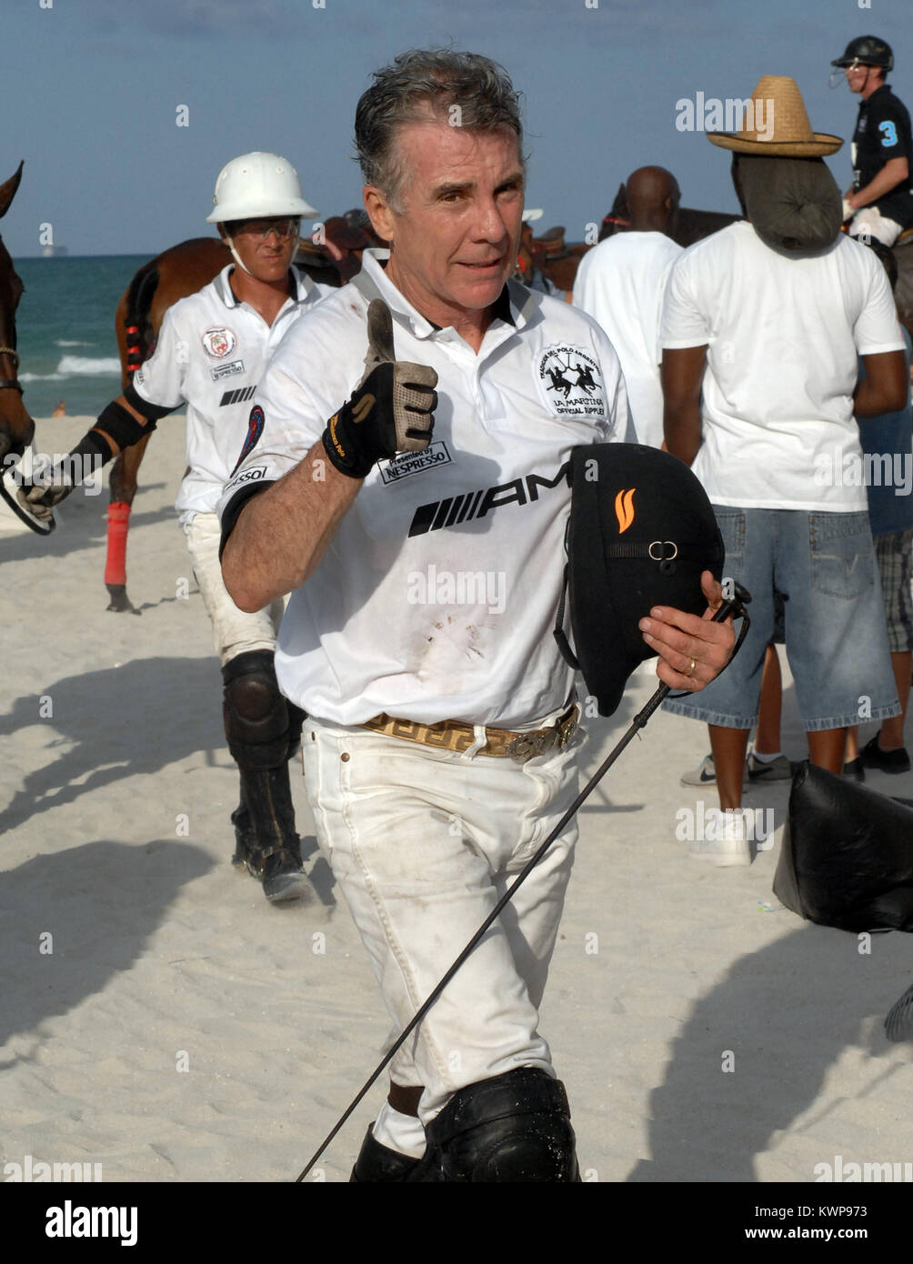MIAMI BEACH, FL - APRIL 22:  'America's Most Wanted' host John Walsh attends AMG Miami Beach Polo World Cup - Twenty-eight-year-old Meghan Walsh also attended the event to support her dad and showcase her own fashion designs.  John Edward Walsh (born December 26, 1945) is an American television personality, criminal investigator, human and victim rights advocate and the host of America's Most Wanted. Walsh is known for his anti-crime activism, which he became involved with following the murder of his son, Adam, in 1981; in 2008, the now deceased serial killer Ottis Toole was named as the kille Stock Photo