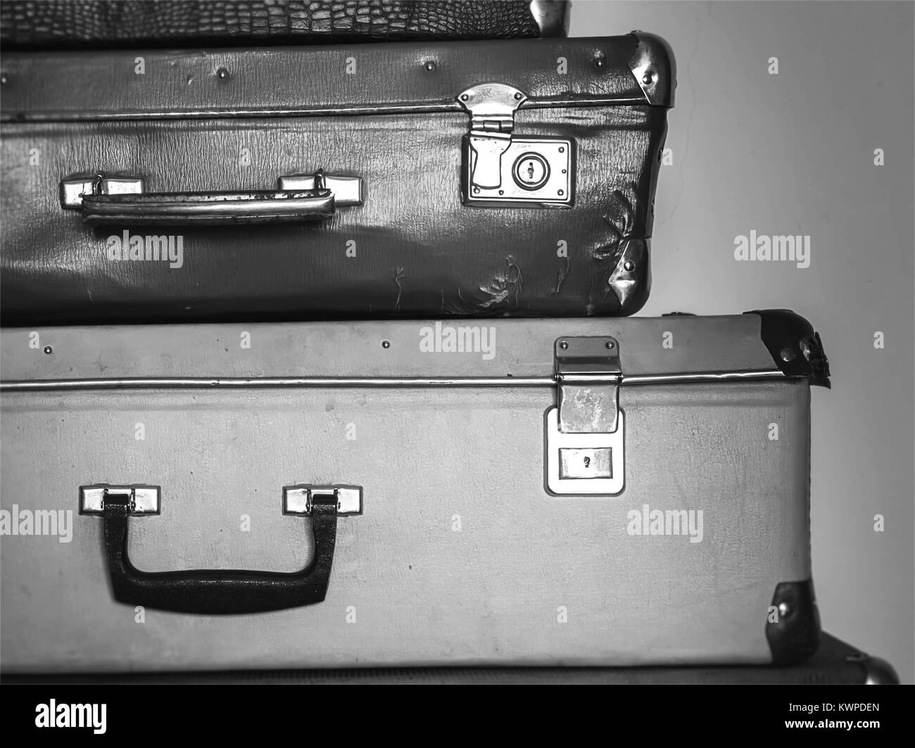 Vintage travel concept with baggage on black and white colors. Stock Photo