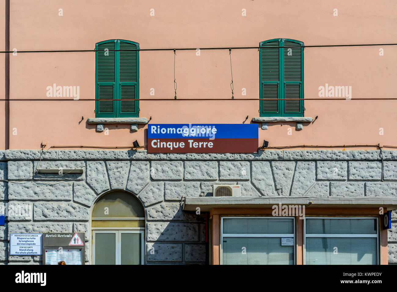 The railway train station and village sign for Riomaggiore Italy on the coast of the Cinque Terre Stock Photo