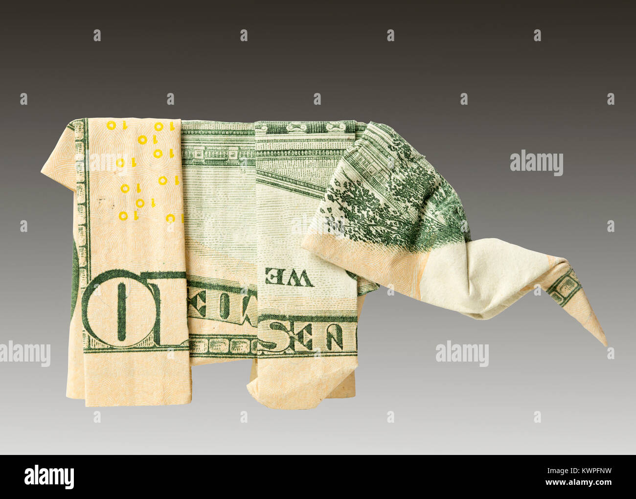 An origami elephant folded from a US ten dollar bill Stock Photo