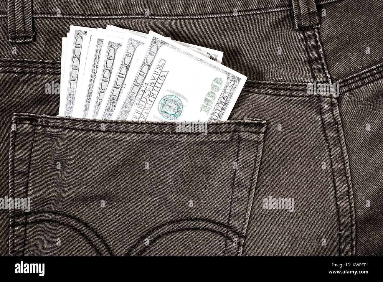 pocket pants stuffed with 100 Dollar bill Stock Photo Alamy