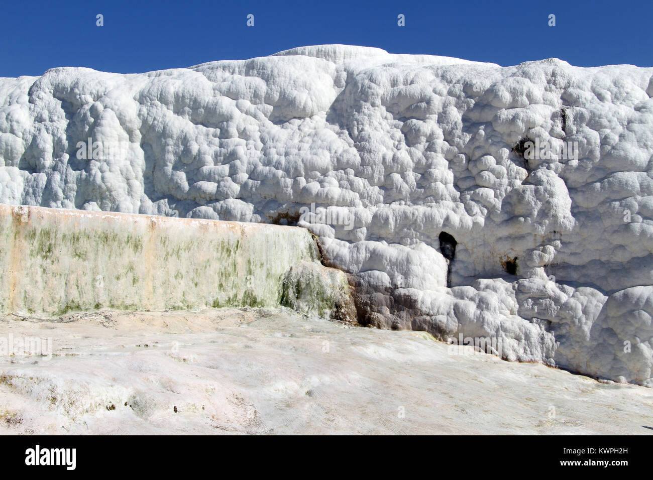 Pool and white travertine formations in Pamukkale, Turkey Stock Photo ...