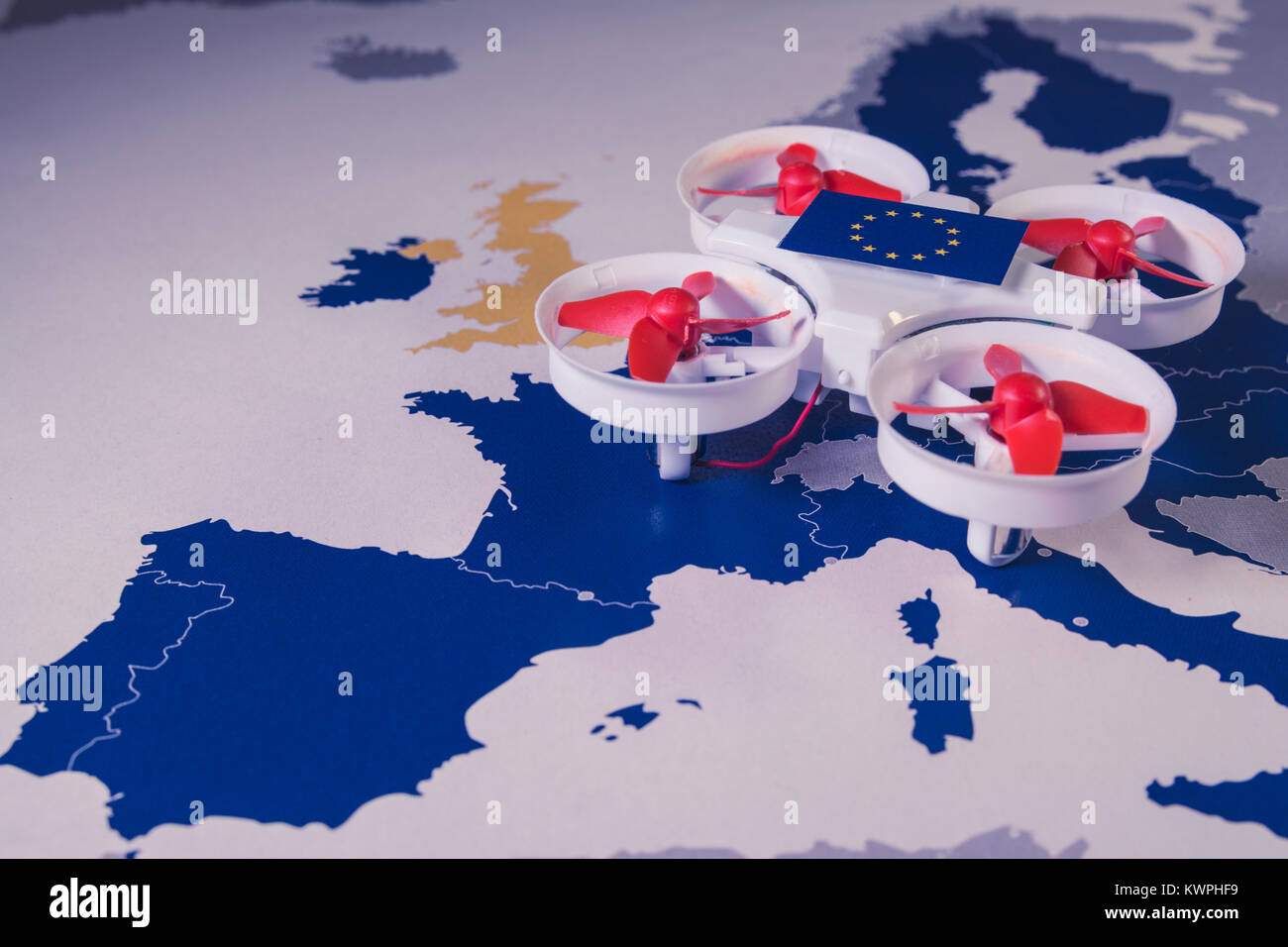 Mini drone flying over a EU map. European rules for drone aerial
