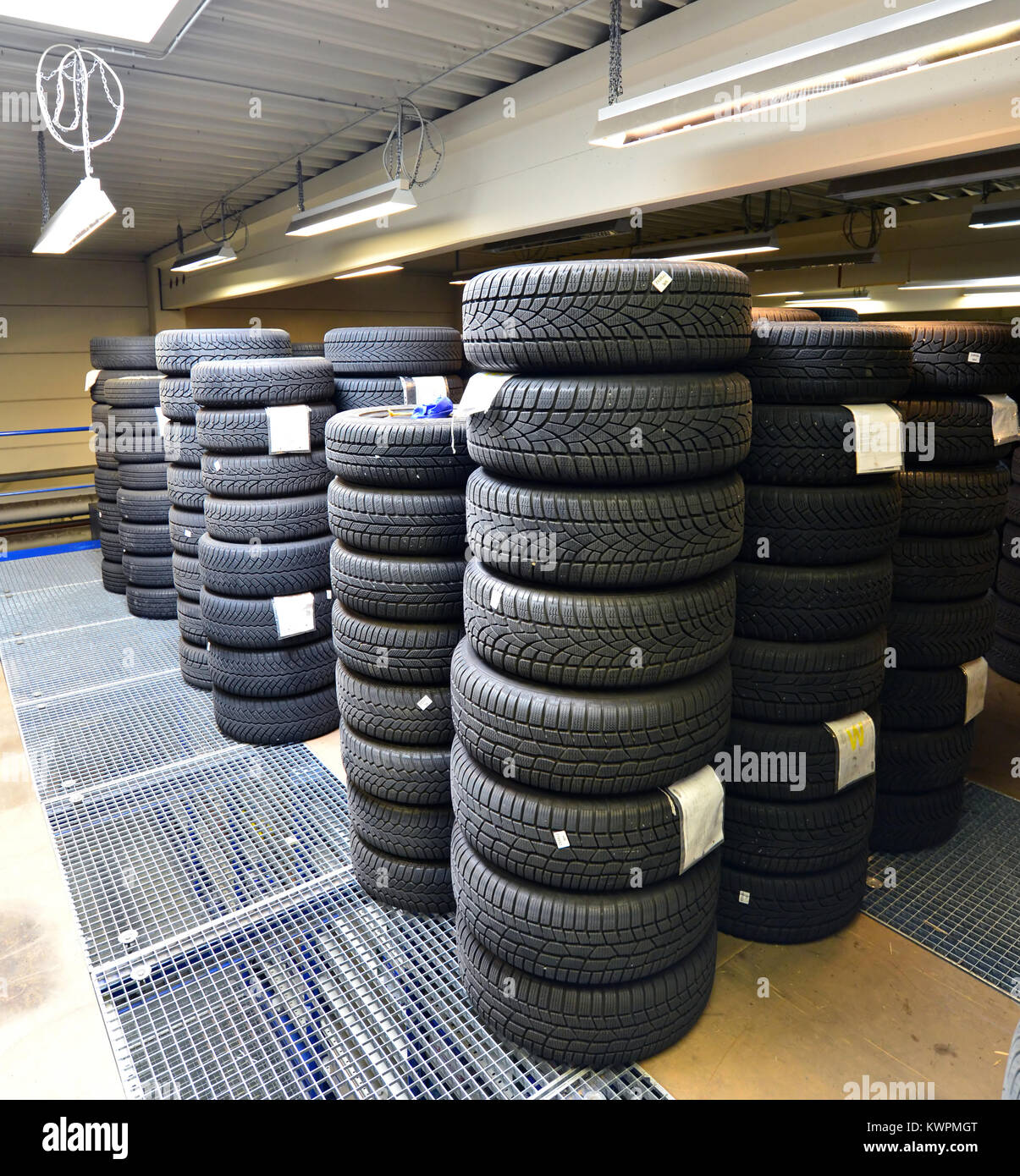 department store with car tyres in a garage tyre change Stock Photo
