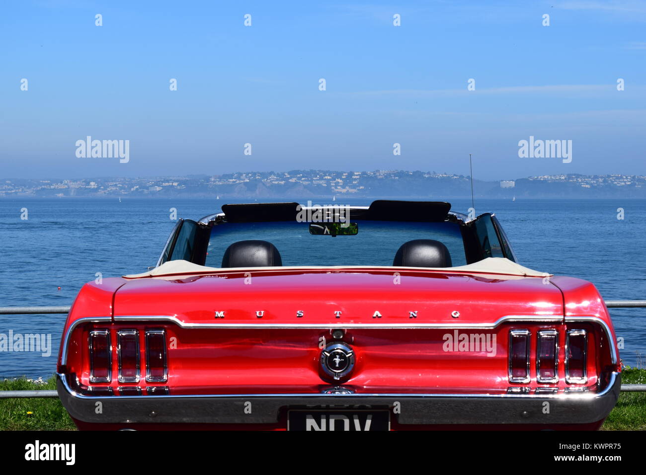 Old Mustang Car by the beach in Devon Stock Photo