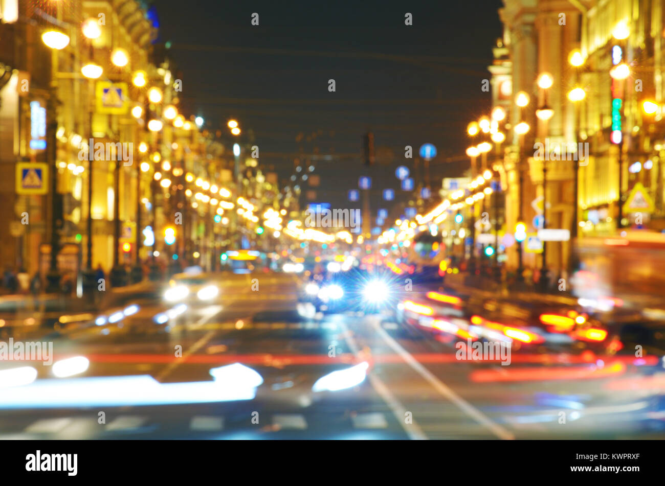 Electric city lights at night.Riding cars create light lines Stock