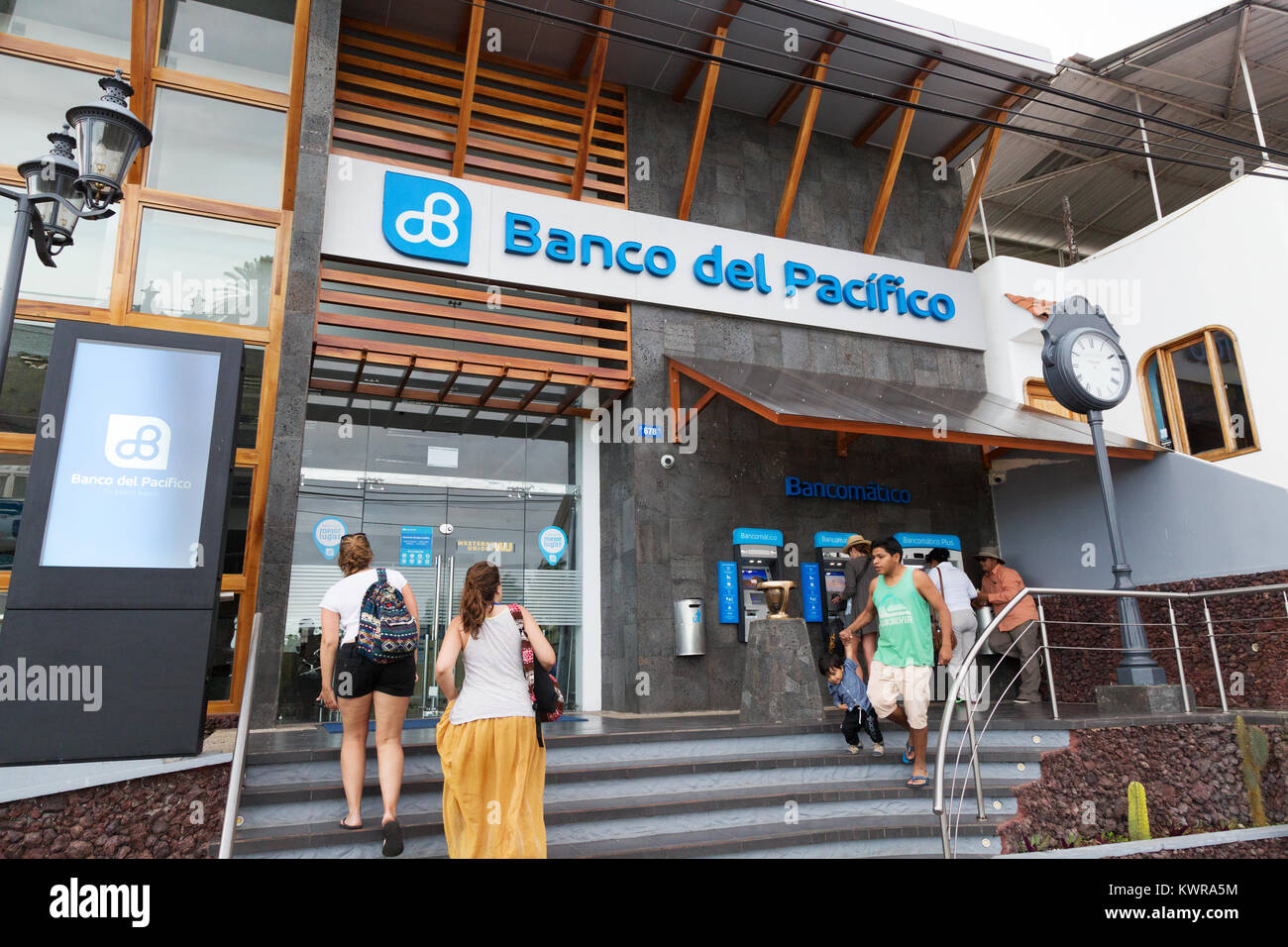 Galapagos Bank - people at the branch of the Banco del Pacifico, Puerto Ayora, Santa Cruz island, Galapagos islands, Ecuador South America Stock Photo