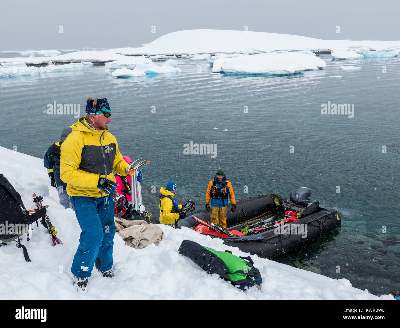 Doug Stoup; owner of Ice Axe Expeditions; helps to load large