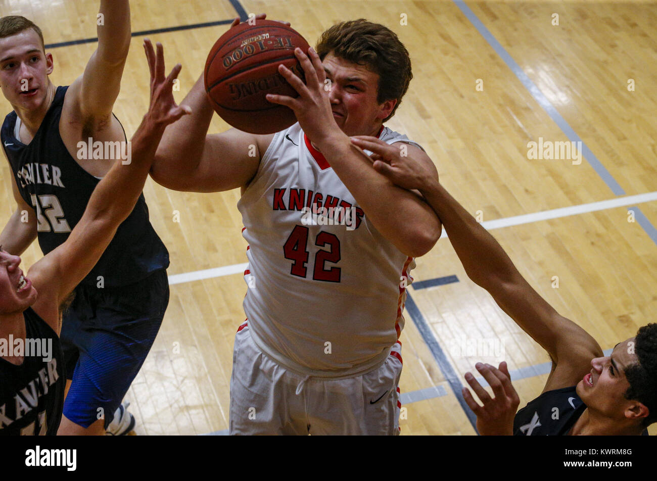 Nolan Butkowski Davenport, Iowa, USA. 3rd Jan, 2017. Assumption's Brock Grenier (42 ...