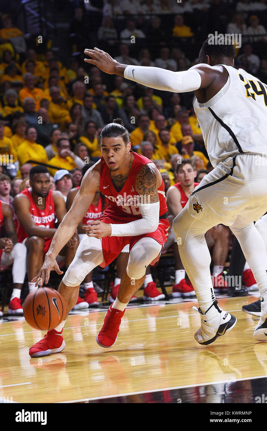 Wichita, Kansas, USA. 4th Jan, 2018. Houston Cougars guard Rob Gray (32) drives the baseline in the second half during the NCAA Basketball Game between the Houston Cougars and the Wichita State Shockers at Charles Koch Arena in Wichita, Kansas. Kendall Shaw/CSM/Alamy Live News Stock Photo