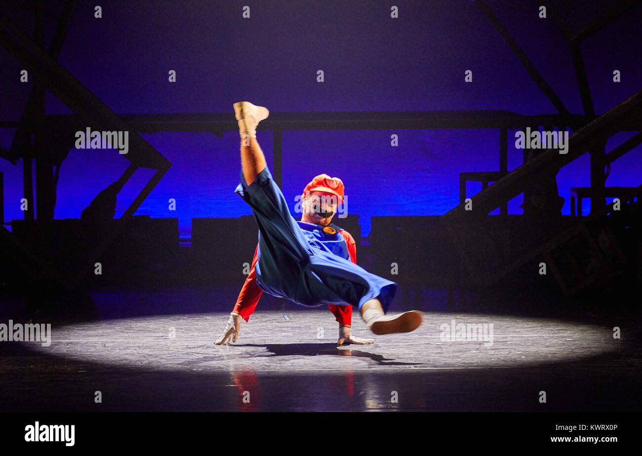 Hamburg, Germany. 05th Jan, 2018. The dancer Bruce Almighty performs as Super Mario during a press event for the dance show 'The Nutcracker Reloaded - Tchaikovksy meets street dance' at the Kampnagel in Hamburg, Germany, 05 January 2018. The German premiere is on 05 January 2018. Credit: Georg Wendt/dpa/Alamy Live News Stock Photo