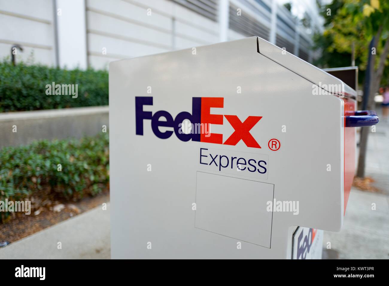Close-up of the logo for FedEx (Federal Express) on a package drop box in an office park in Concord, California, September 8, 2017. Stock Photo
