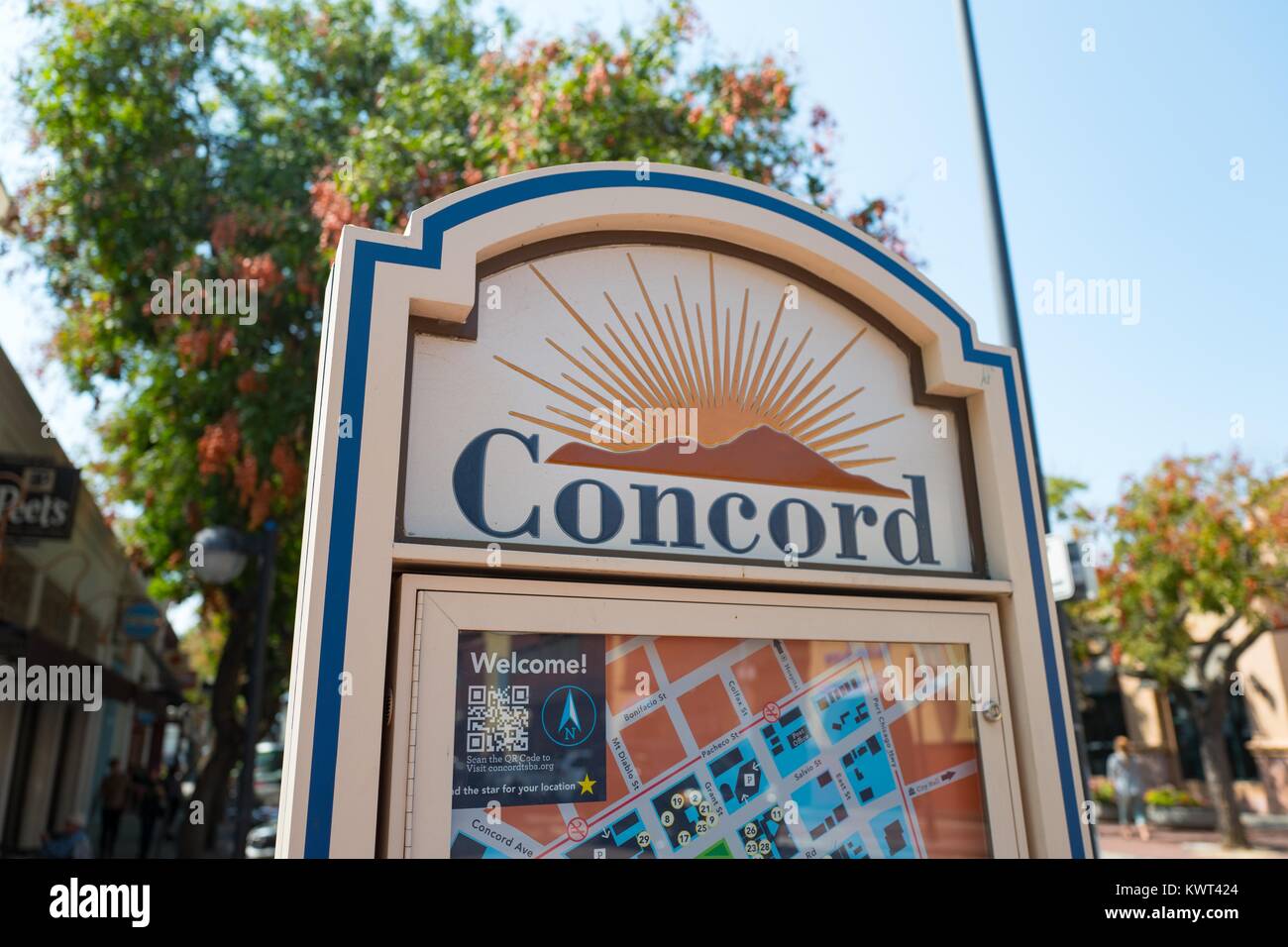 Sign with logo reading 'Concord' and a map showing stores on Todos