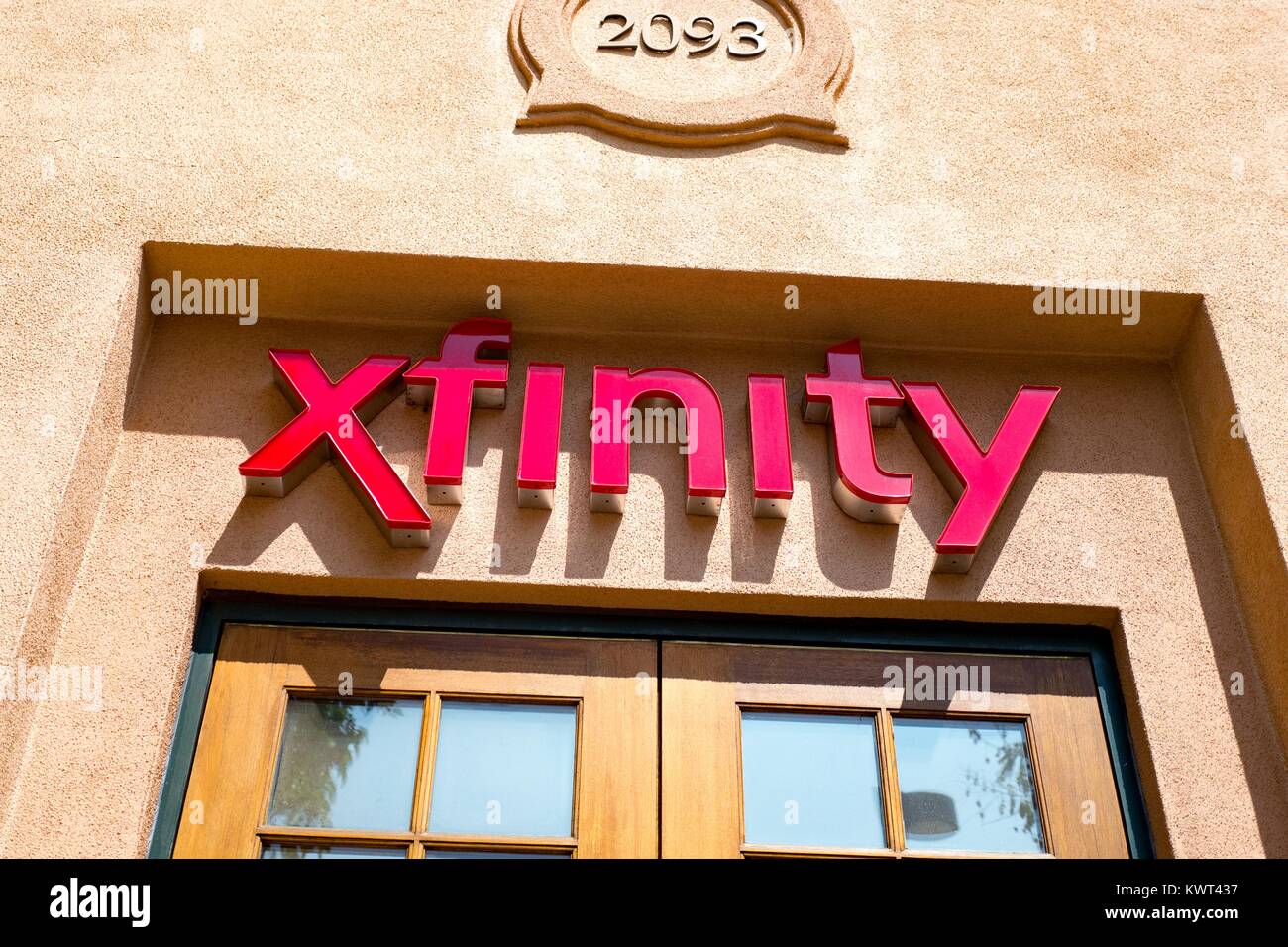 Close-up of signage with logo at the Comcast Xfinity store in downtown Concord, California, September 8, 2017. Stock Photo