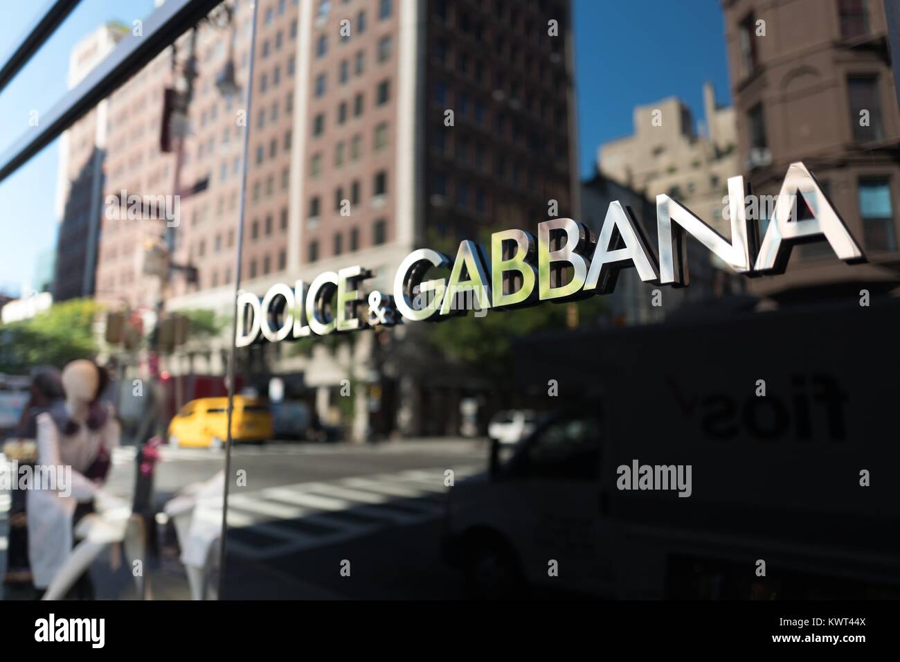 Signage for the Dolce and Gabbana upscale clothing boutique on Madison Avenue on the Upper East Side of Manhattan, New York City, New York, September 15, 2017. () Stock Photo