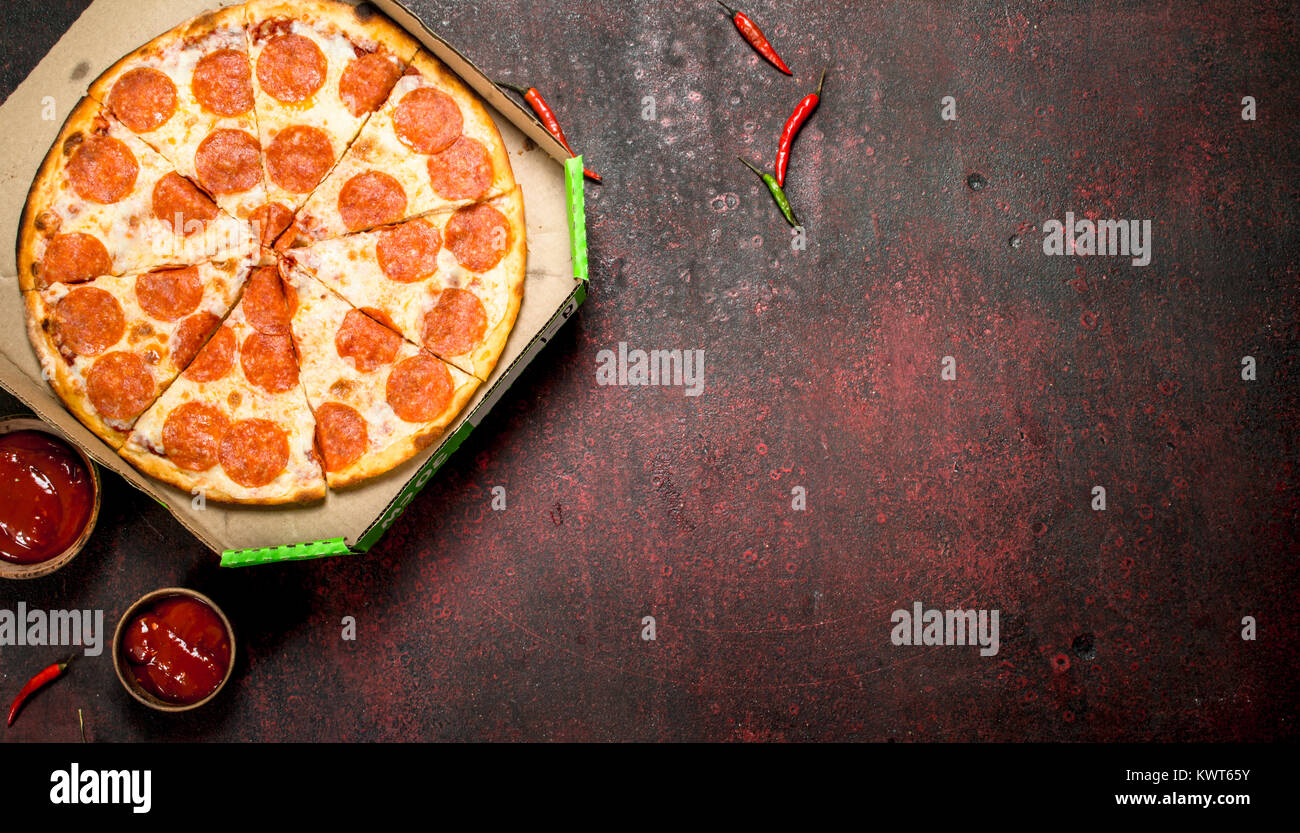 Pepperoni Pizza With Sausage And Cheese On A Rustic Background Stock Photo Alamy Pepperoni Pizza With Sausage And Cheese On A Rustic Background Stock Photo Alamy