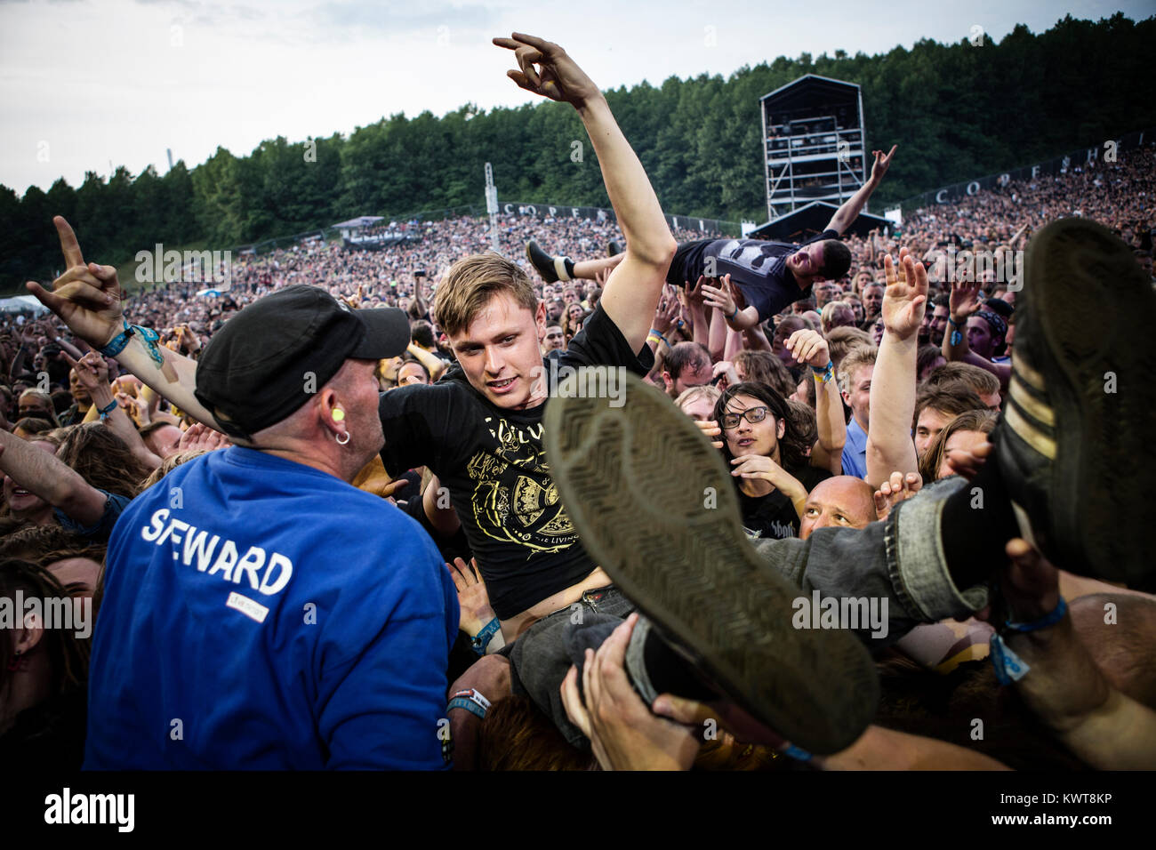 Music and heavy metal fans attend a live concert with the American ...