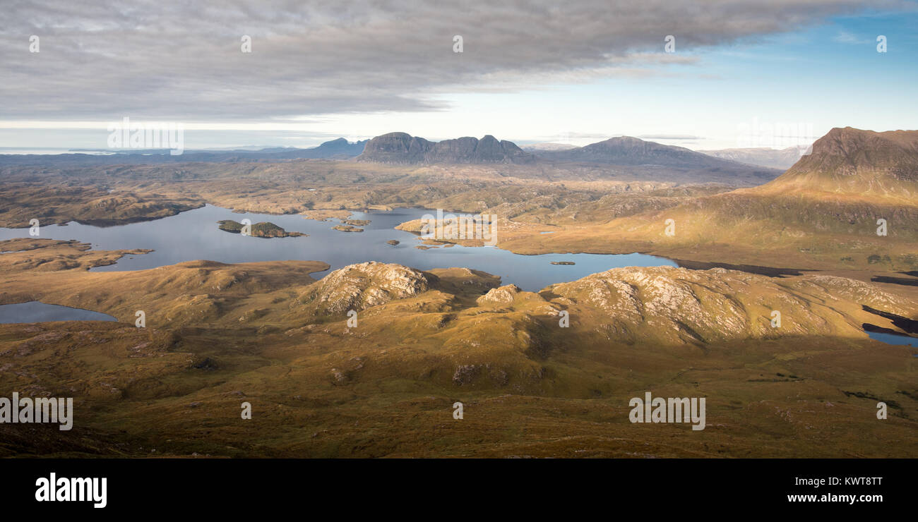 The distinctive glacial landscape of Inverpolly Forest in Assynt, in the Highlands of Scotland, with Suilven mountain rising from among a complex of l Stock Photo