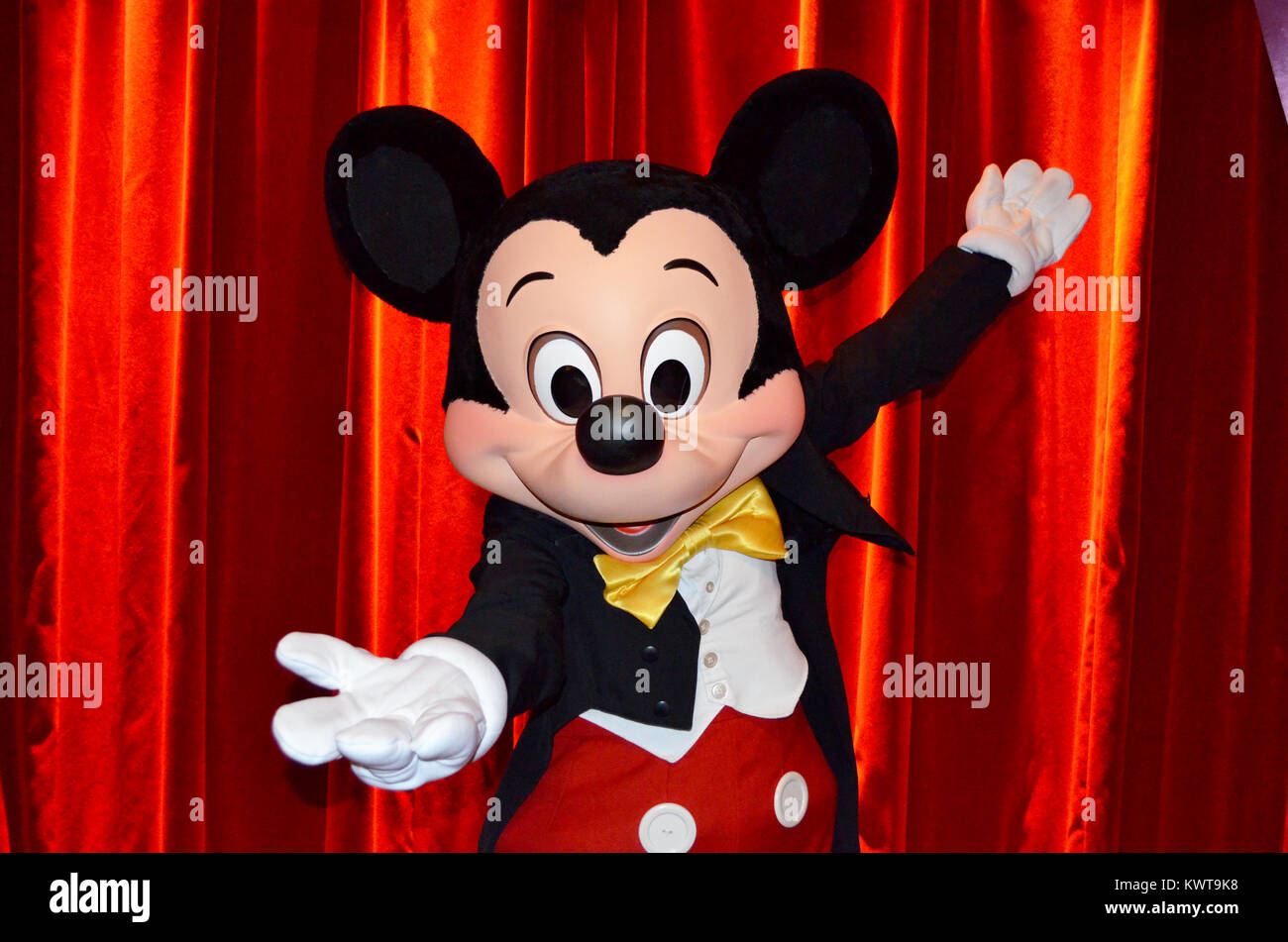 Paris - France, Circa June, 2013. Mickey Mouse making one of his poses in the Meet Mickey Mouse pavilion in Disney Paris. Stock Photo