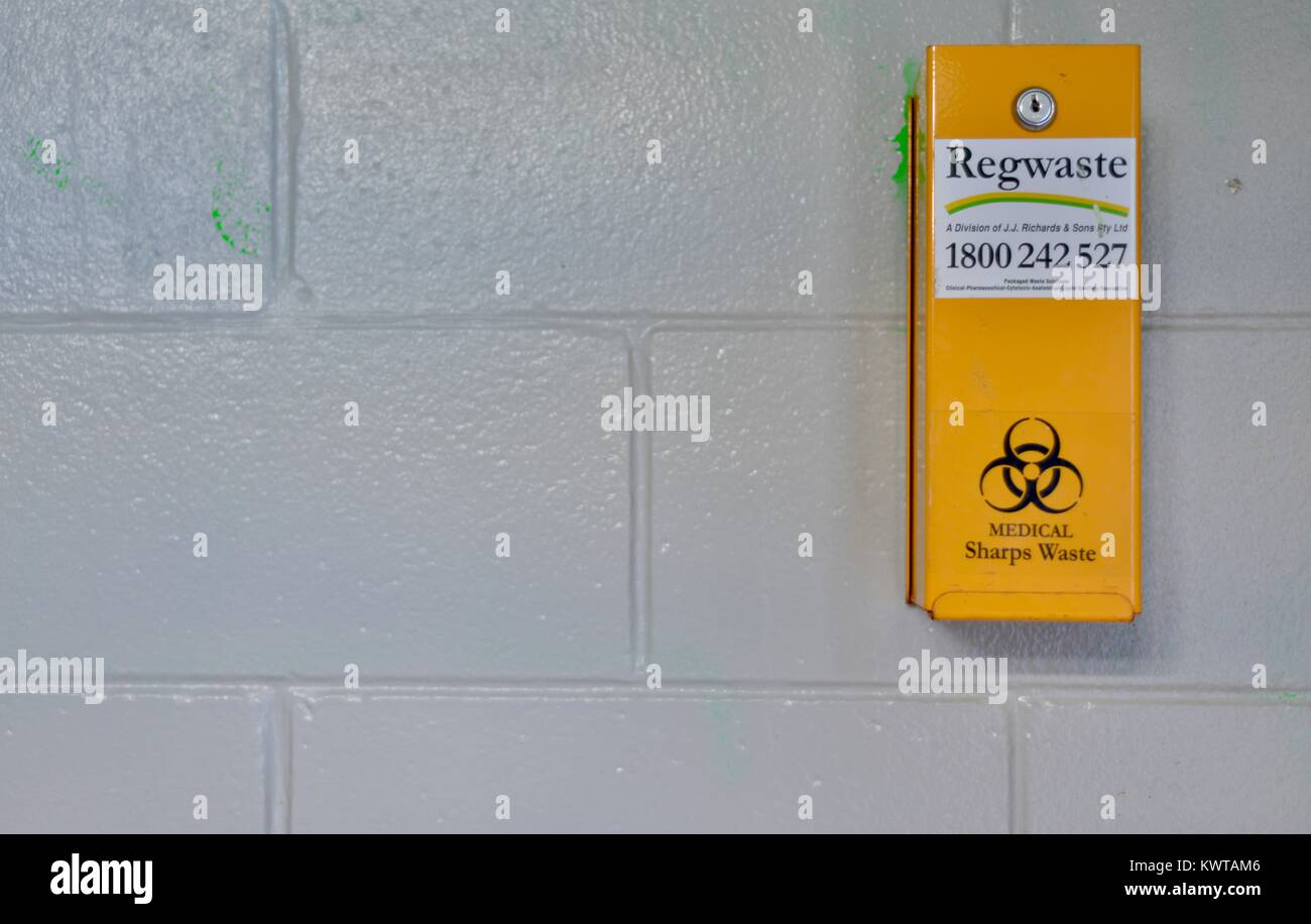 Sharps waste, syringe disposal container in public toilet, Sherriff
