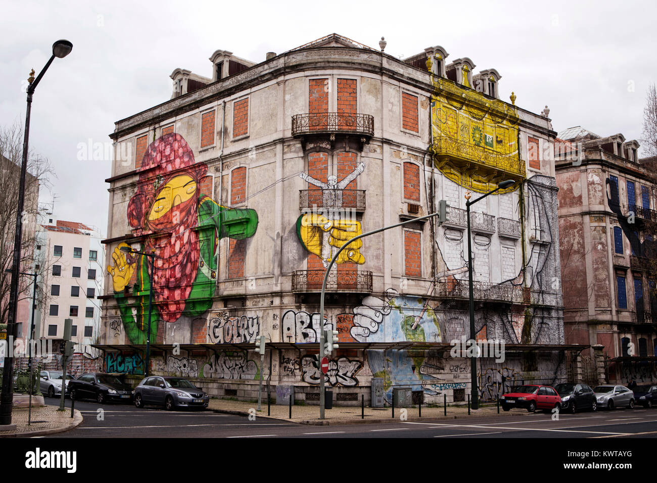 Corner building at Av Fontes Pereira de Melo has been painted by the street artist Gêmeos (to the left) and BLU, They created some amazing figures that draws the attention to the neglected buildings. Portugal 2013. Stock Photo