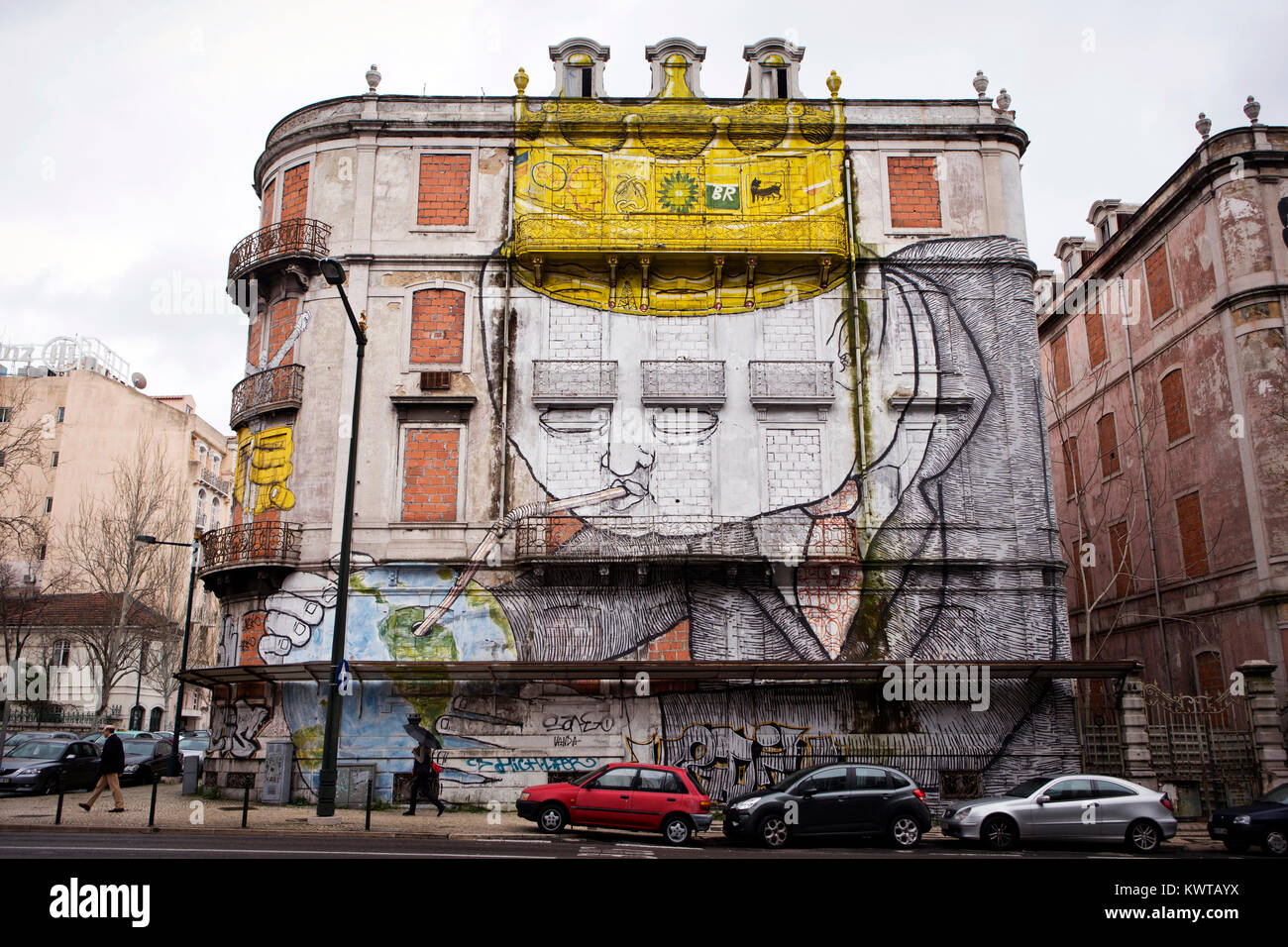A gigantic spooky man with a golden crown painted by street art artist BLU at a corner building at Av Fontes Pereira de Melo in Lisbon. Portugal 2013. Stock Photo