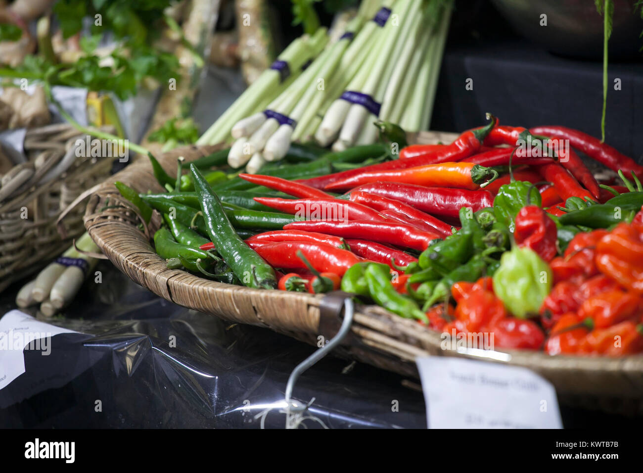 the Different types of pepper on the counter on the Borough market in London. Stock Photo