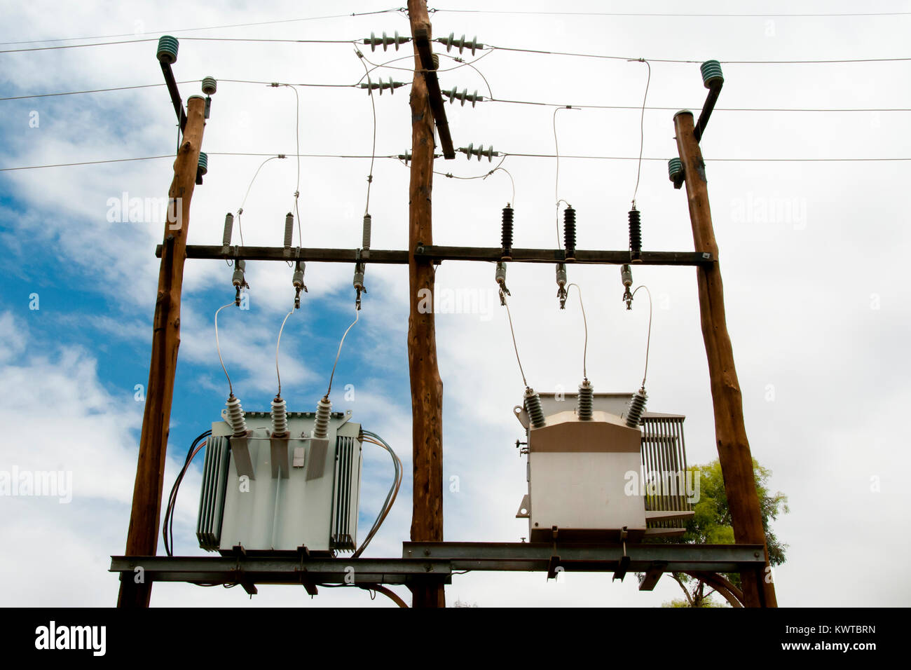 Electric Transformers on Poles Stock Photo - Alamy