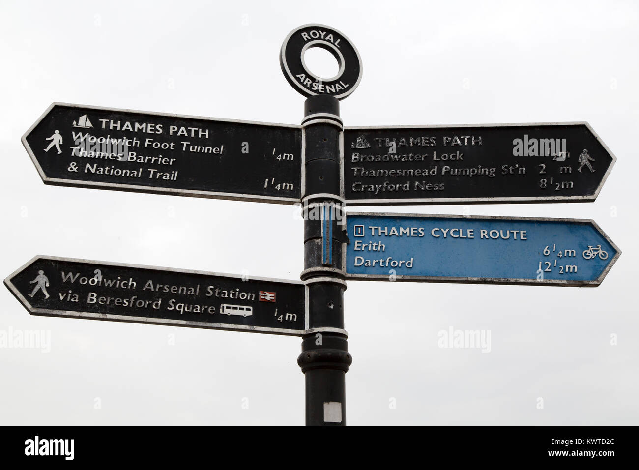 Sign at Royal Arsenal in London, England. The sign points to places of interest along the footpath and cycle track running alongside the River Thames. Stock Photo