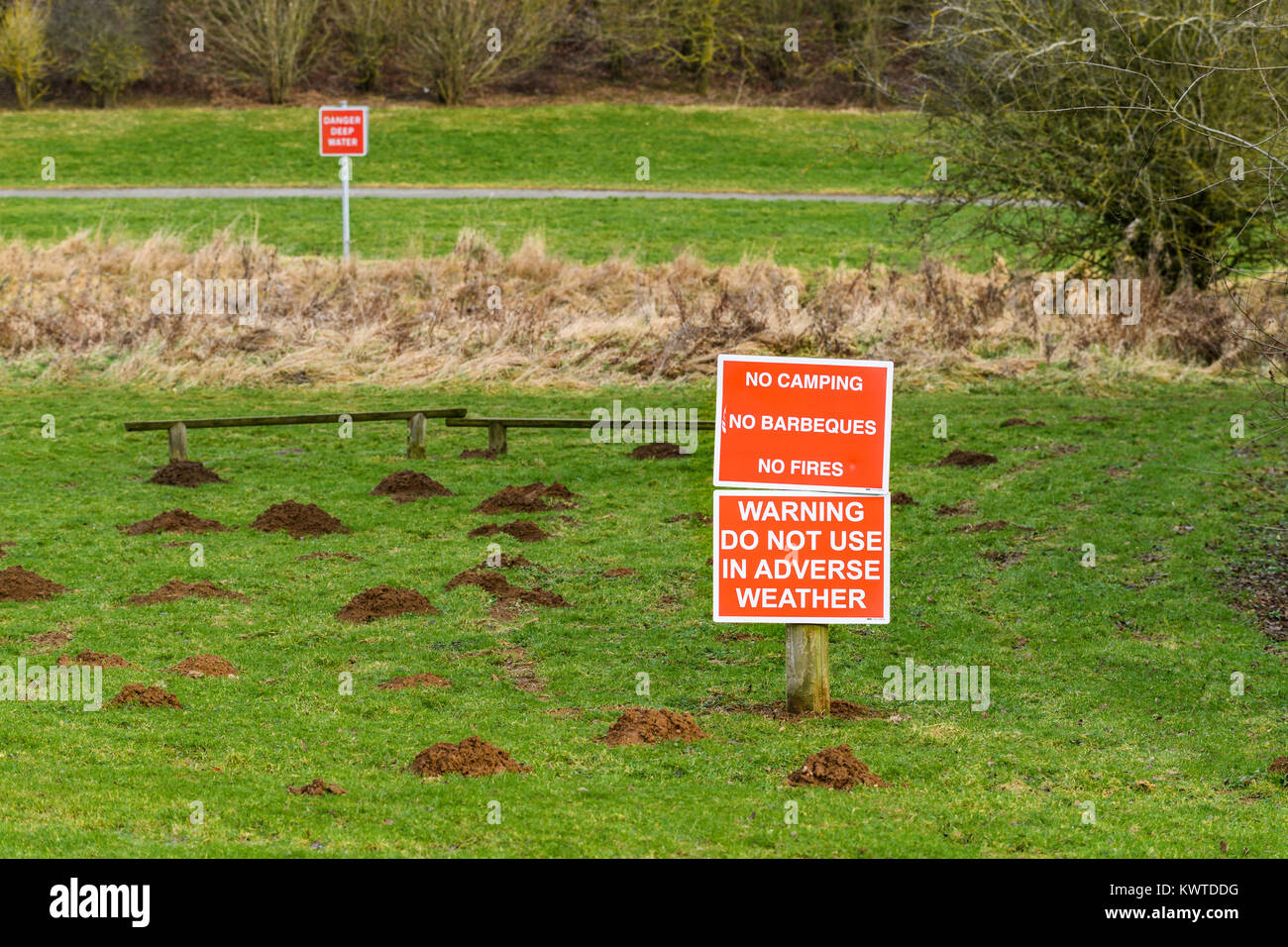 Red sign forbidding barbecues, camping, fires Stock Photo