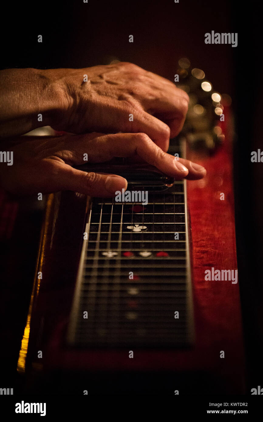 A pedal steel guitarist, composer and musician placed her hands on the