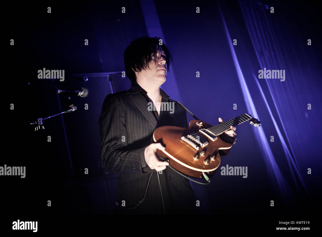 The American rock band Queens of the Stone Age performs a live concert at Vega in Copenhagen. Here guitarist Troy Van Leeuwen is pictured live on stage. Denmark 08/05 2011. Stock Photo