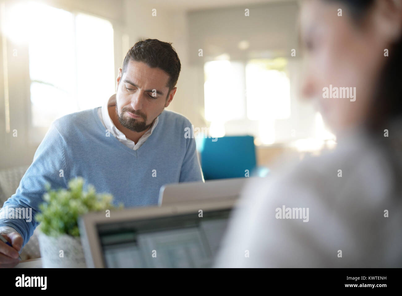 Startup people working in office on laptop computer Stock Photo - Alamy