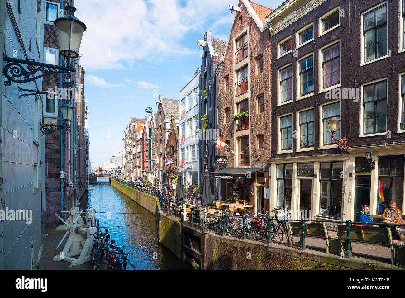 Amsterdam, Netherlands - April 19, 2017: Important tourist attraction in Amsterdam - the small canals in the city center. Stock Photo