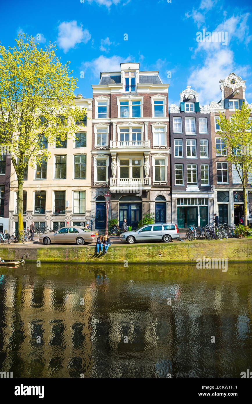 Amsterdam, Netherlands - April 19, 2017: Traditional dutch medieval buildings, beautiful architecture in Amsterdam Stock Photo