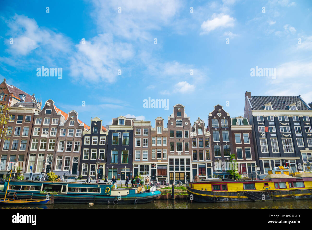 Amsterdam, Netherlands - April 20, 2017: Traditional dutch medieval buildings, beautiful architecture in Amsterdam Stock Photo