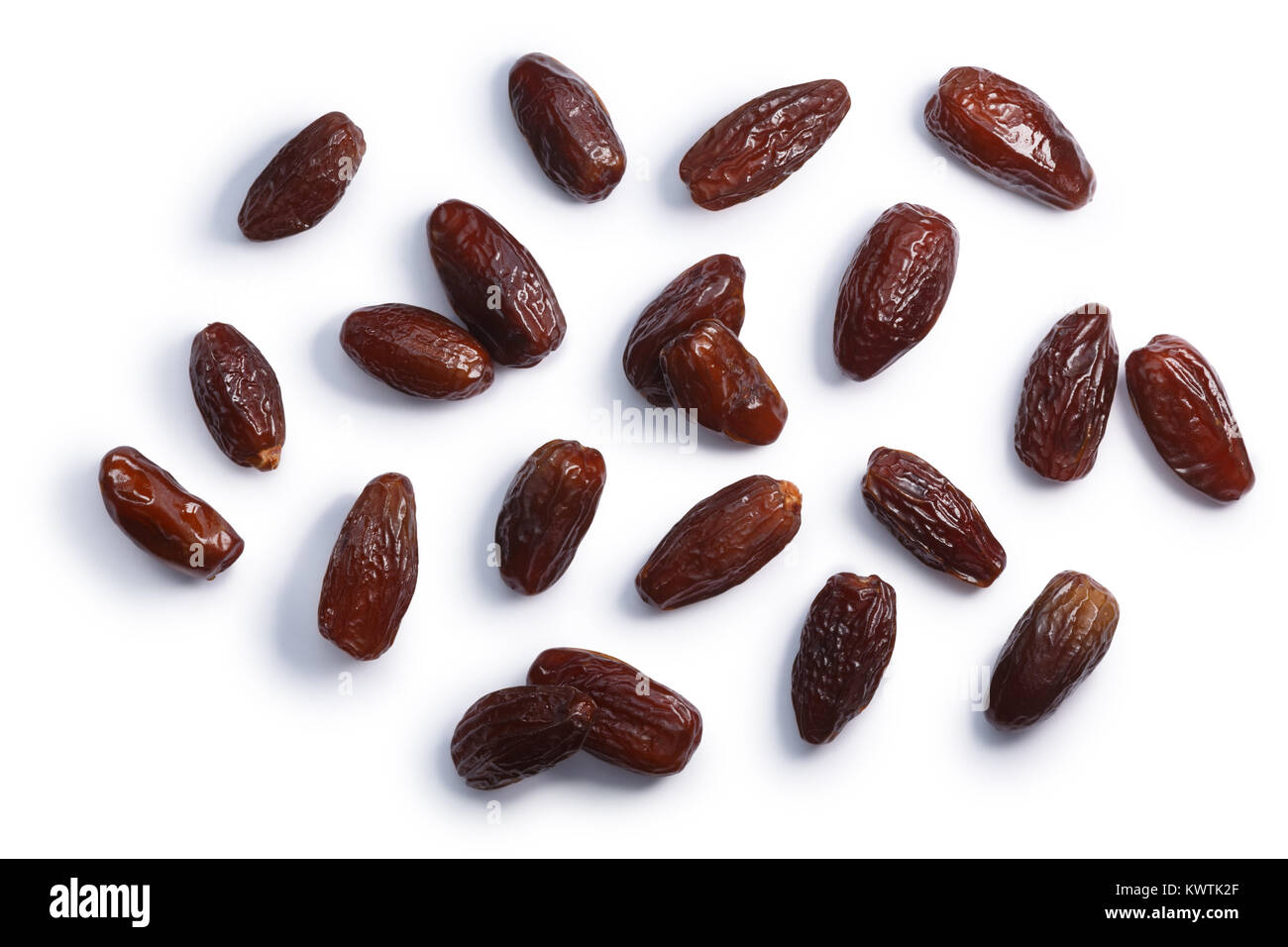 Dried Deglet Nour dates (fruits of date palm Phoenix dactylifera), top view. Clipping paths, shadow separated Stock Photo
