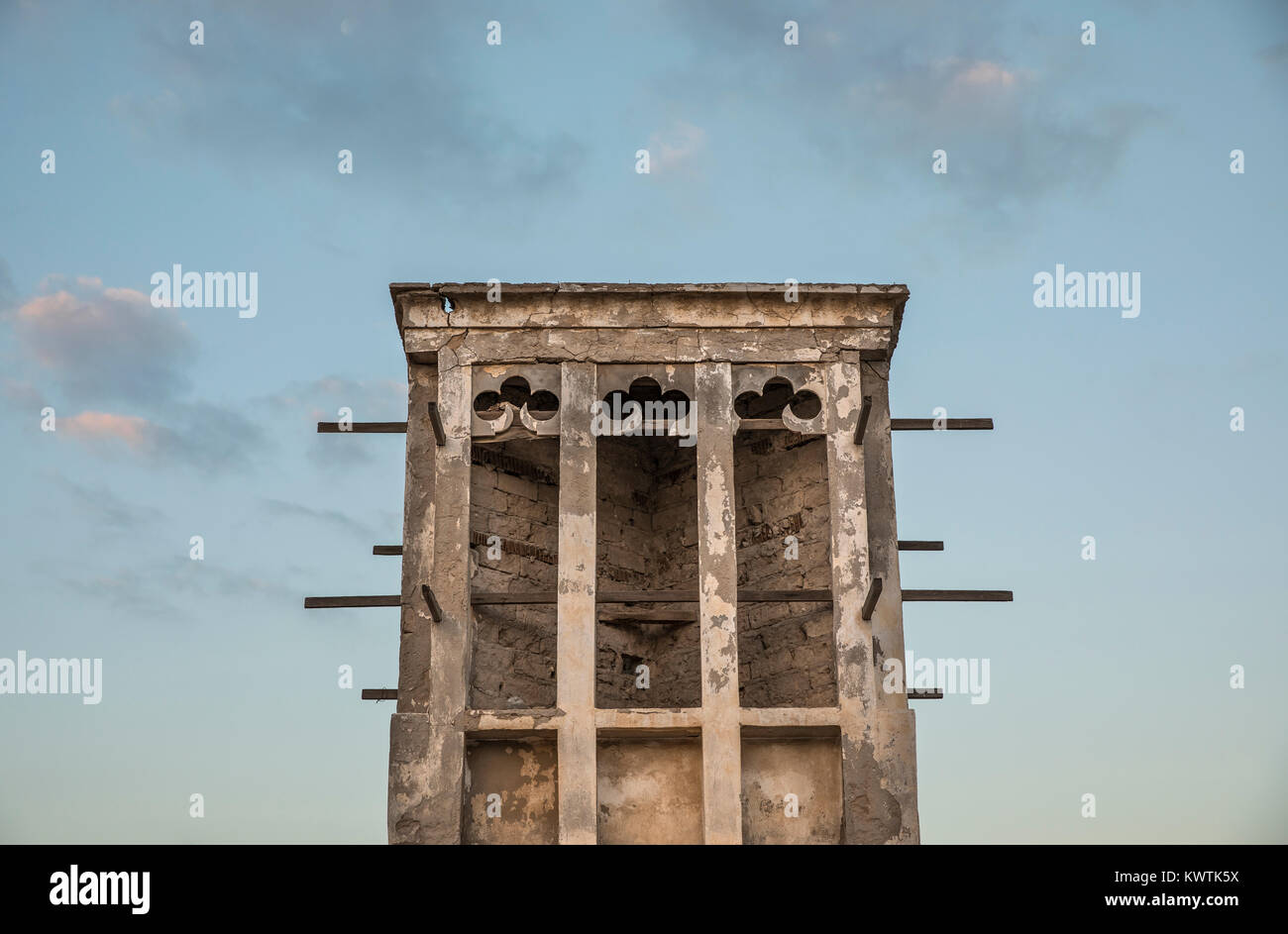 traditional wind tower on top od Old abandoned house in a village in Ras Al Khaimah Stock Photo