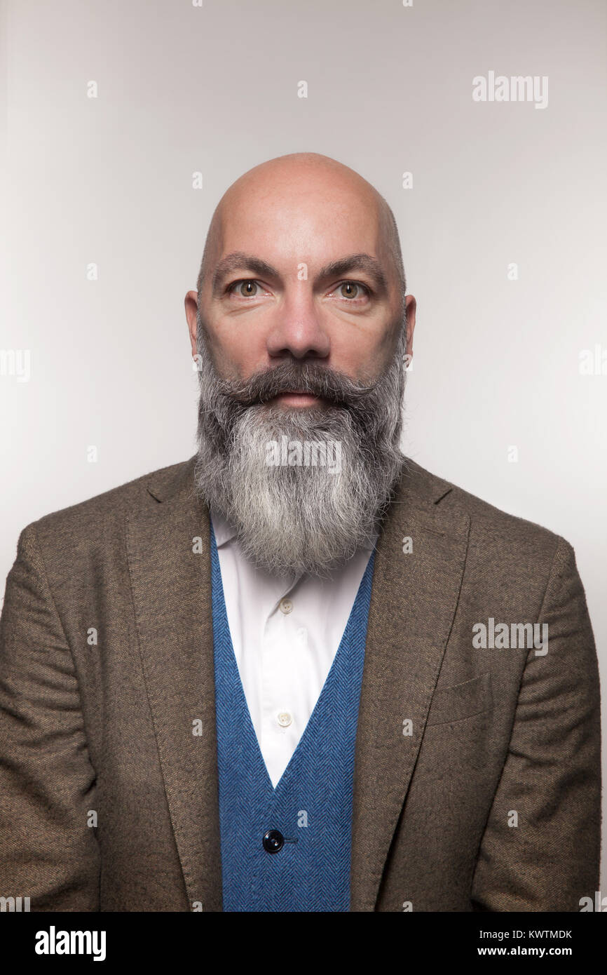 middle-aged man with beard, studio portrait Stock Photo
