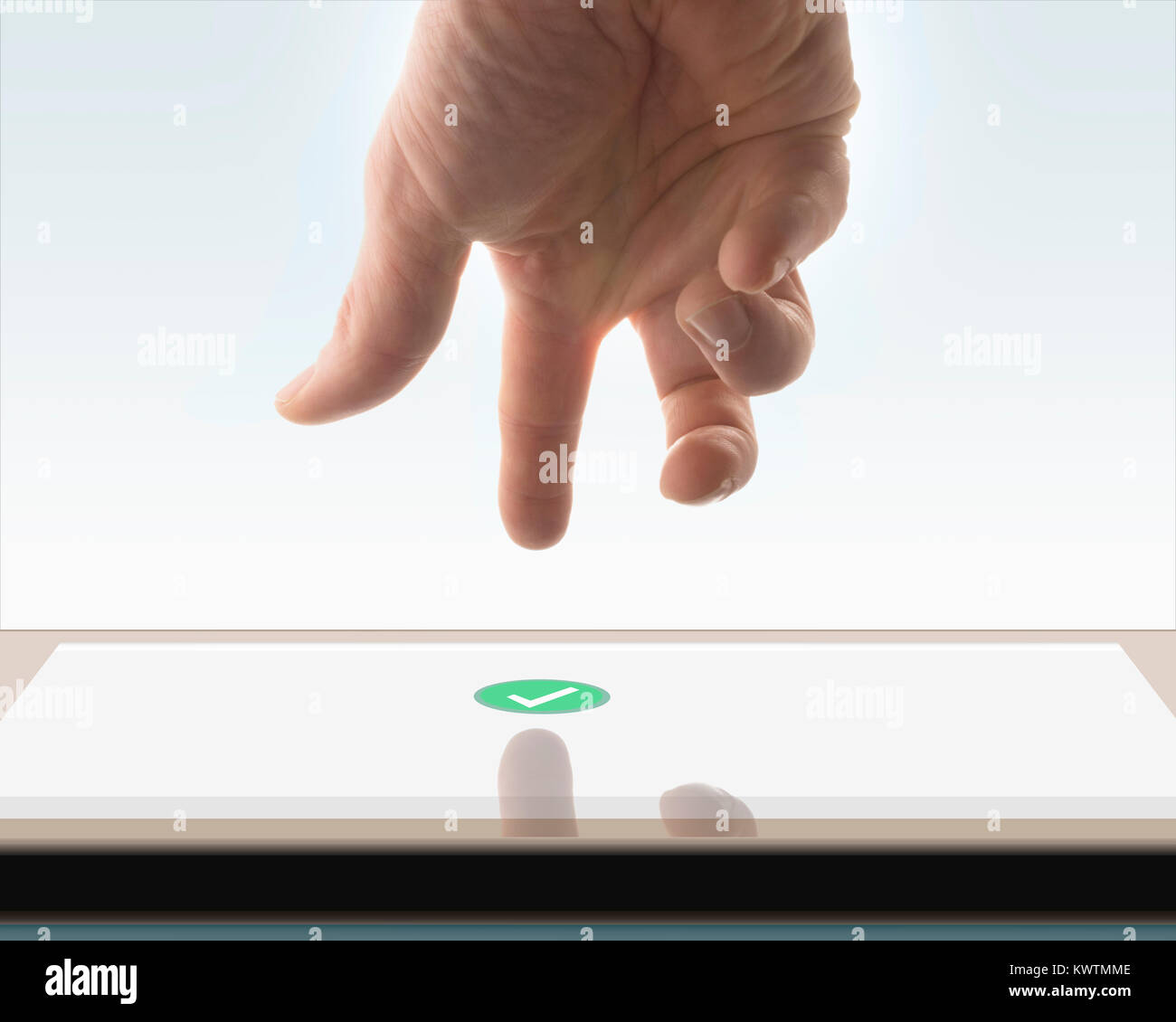 Hand tippt von oben auf Screen mit 'check'-Icon,  mit weissen Hintergrund Stock Photo