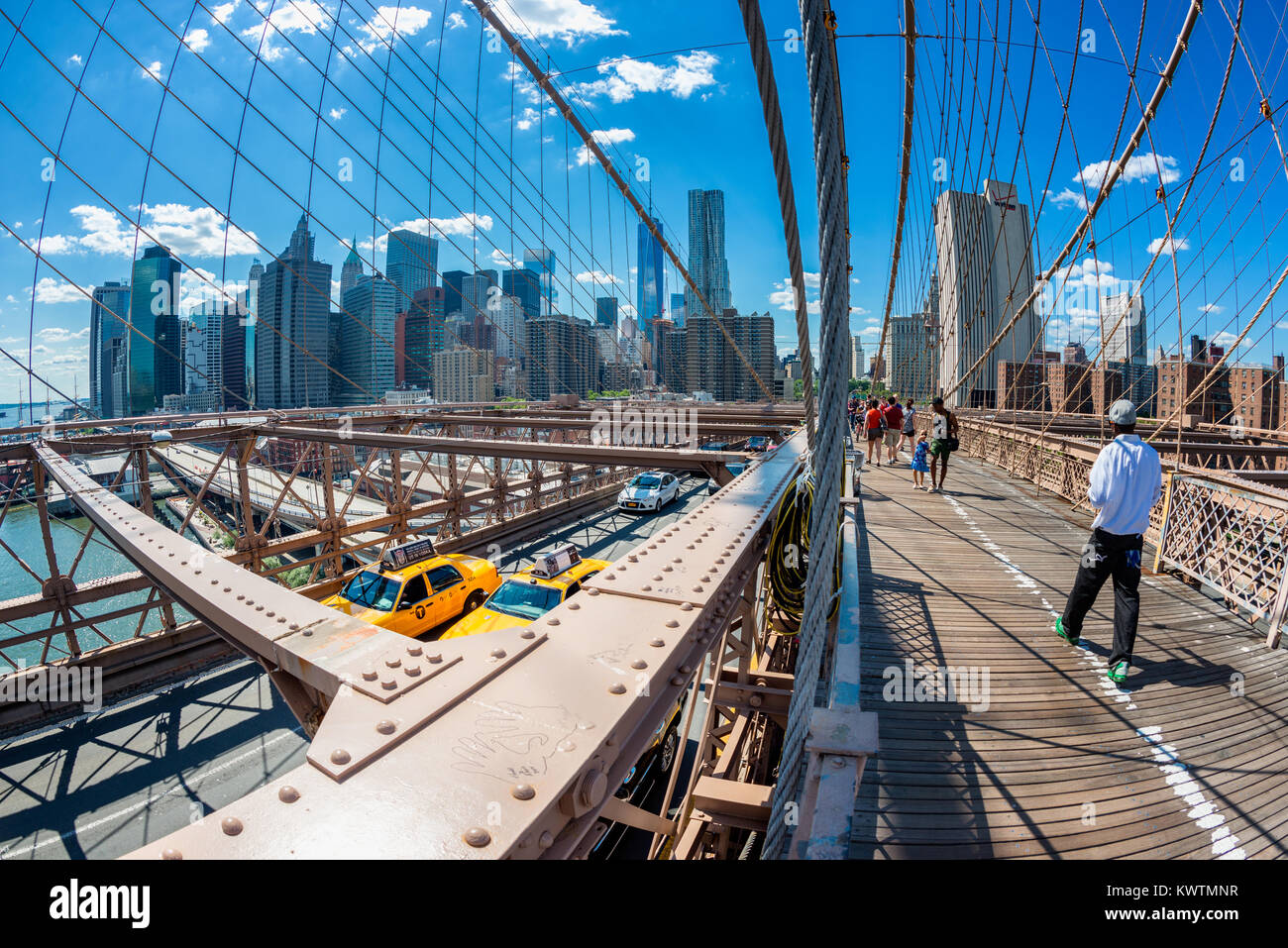 Fisheye view on the famous Brooklyn Bridge, New York City, USA. The Brooklyn Bridge is one of the oldest roadway bridges in the United States. Stock Photo