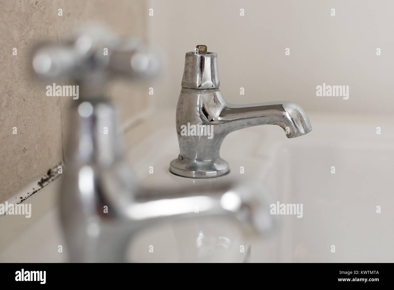 A broken bathroom tap Stock Photo Alamy