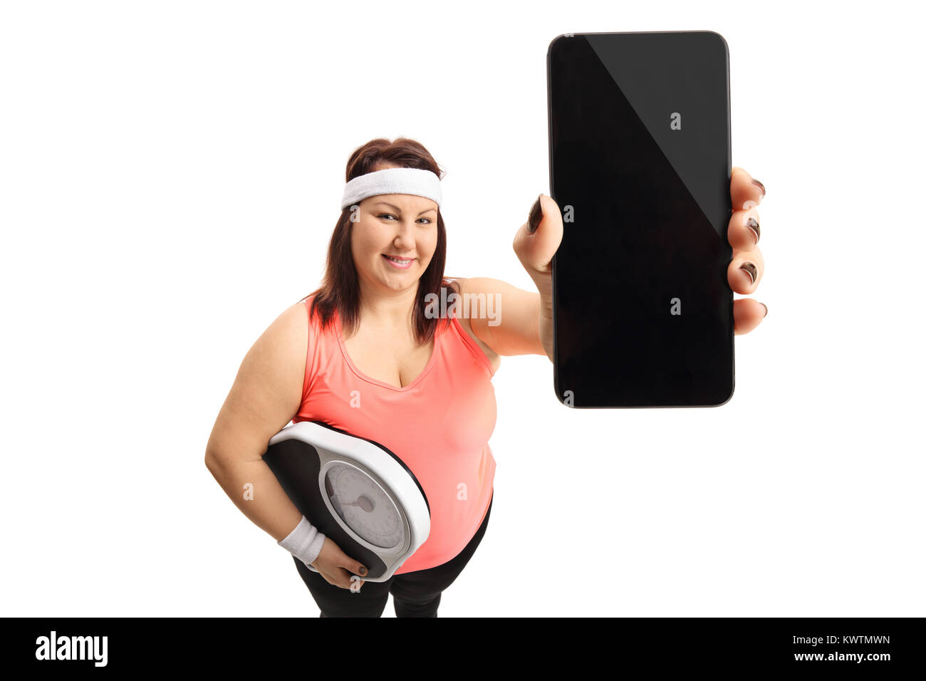 Overweight woman with a weight scale and a phone isolated on white