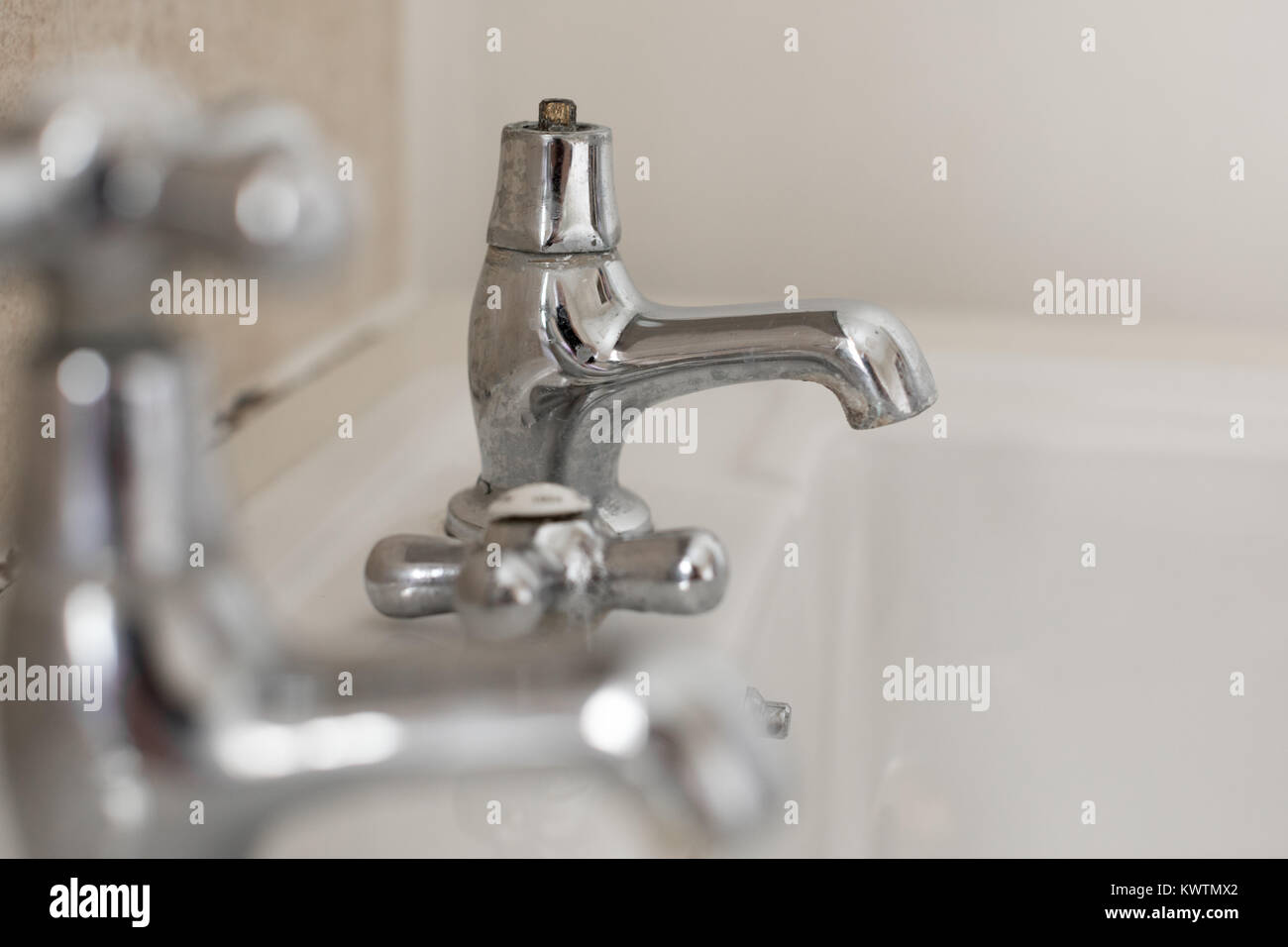 A broken bathroom tap Stock Photo Alamy