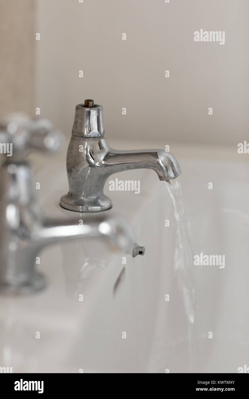 A broken bathroom tap Stock Photo Alamy