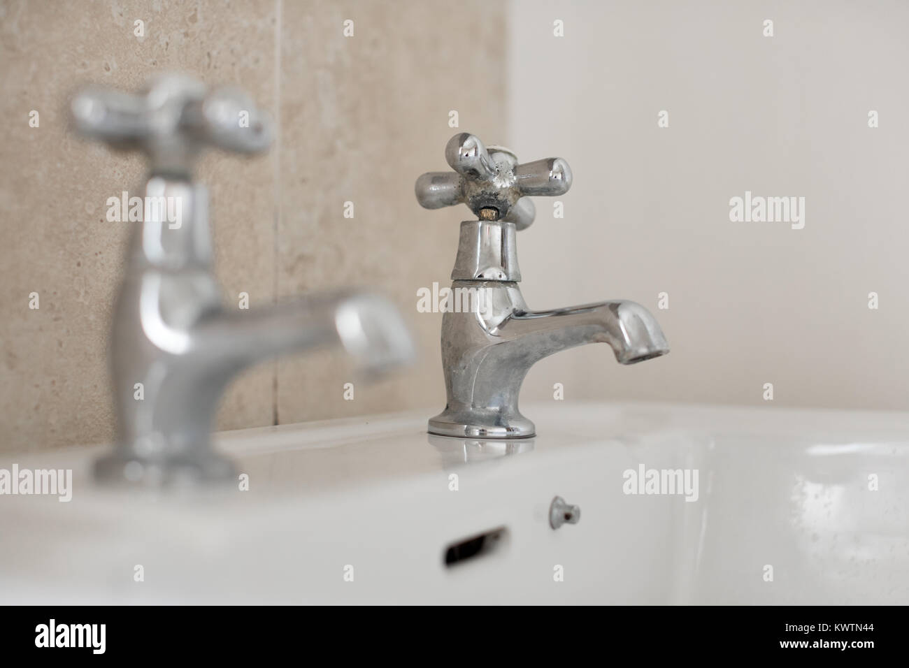 A broken bathroom tap Stock Photo Alamy