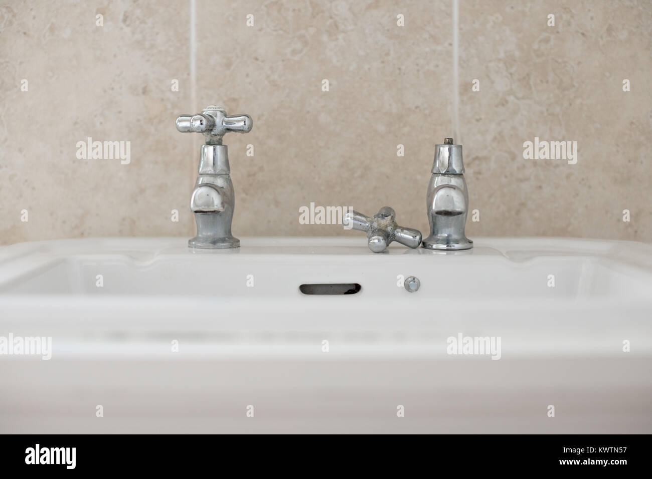 A broken bathroom tap Stock Photo Alamy