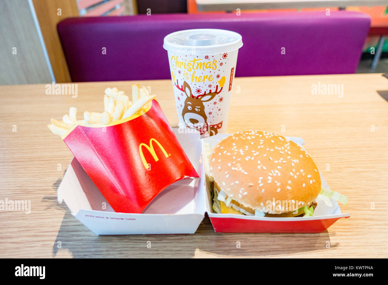 A Big Mac Meal on a table in a McDonald's fast food restaurant. Stock Photo